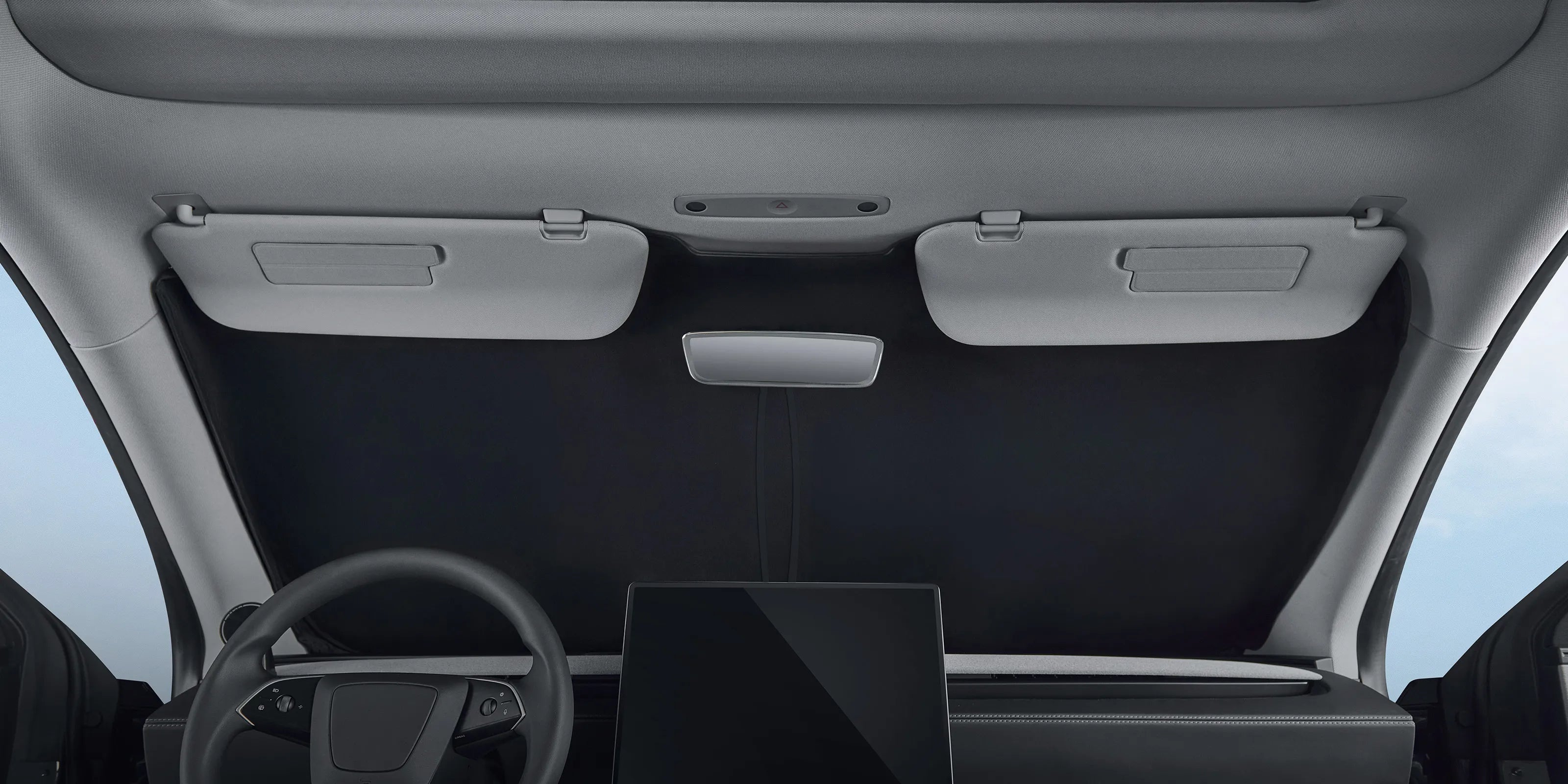 "Custom-fit front windshield sunshade for Tesla, featuring a high-density black fabric for maximum UV protection and heat reduction, perfectly held in place by car sun visors."