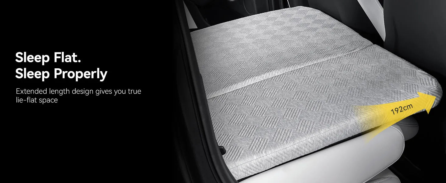 Rear view of a Tesla Model Y Juniper trunk area with the 3W custom split memory foam sleeping mattress fully extended for dual person car camping.