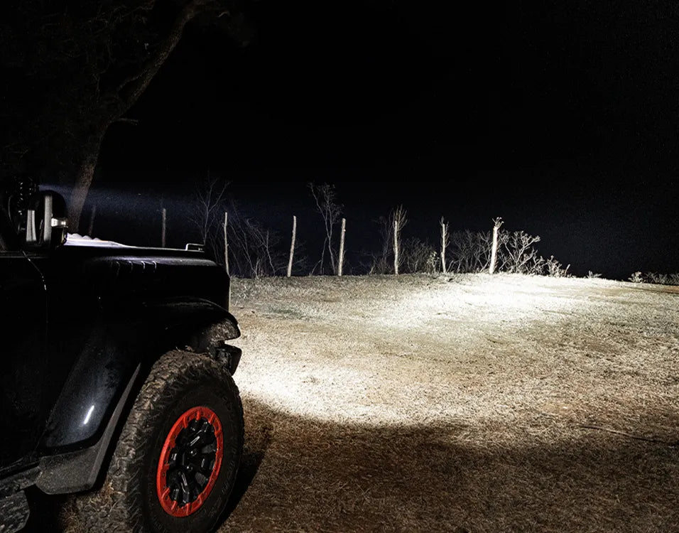 Wolfbox NomadRover 3" off-road LED pods (40W, 4890 LM) on Ford Bronco, with specs.