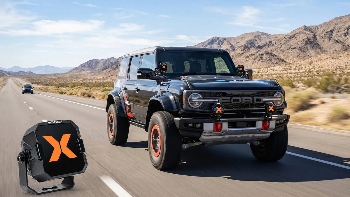 Wolfbox NomadRover 3" off-road LED pods (40W, 4890 LM) on Ford Bronco, with specs.